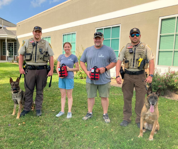 Teresa and Jason Nelson of DogWatch of Southern Minnesota donate K9 Medic Kits to the • Goodhue County Sheriff’s Office 